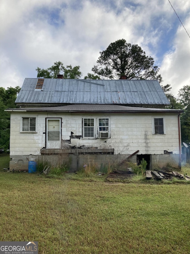 12196 Linton Rd S, Sparta, GA 31087 - rear view of house featuring a yard and metal roof