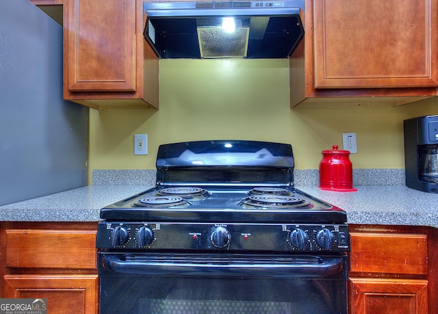 2326 Nicole Dr, Hampton, GA 30228 - kitchen with black electric range oven and extractor fan