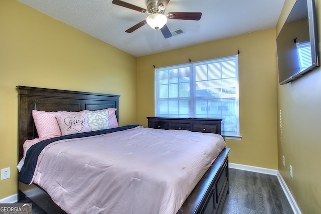2326 Nicole Dr, Hampton, GA 30228 - bedroom with baseboards, dark wood-type flooring, and ceiling fan