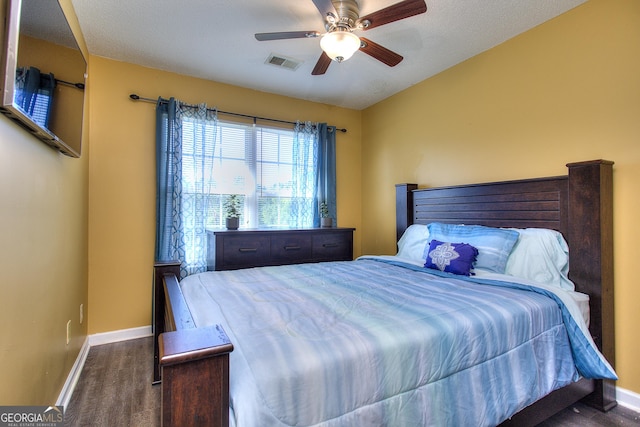2326 Nicole Dr, Hampton, GA 30228 - bedroom with baseboards, wood finished floors, and ceiling fan
