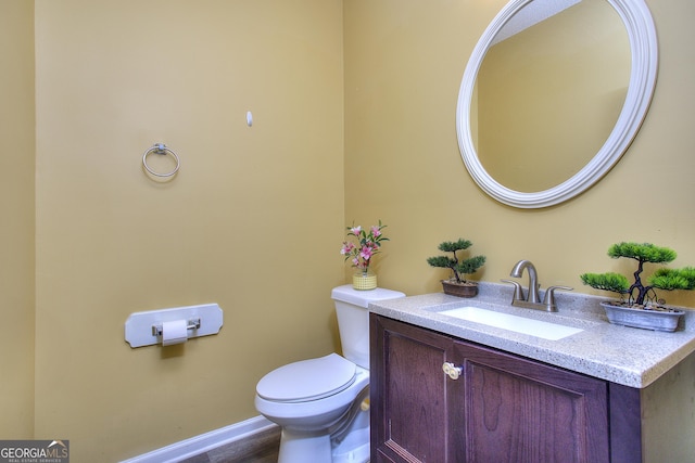 2326 Nicole Dr, Hampton, GA 30228 - half bath featuring toilet, vanity, and baseboards