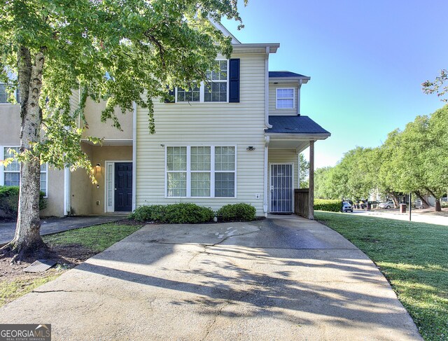 2326 Nicole Dr, Hampton, GA 30228 - view of front facade featuring a front yard