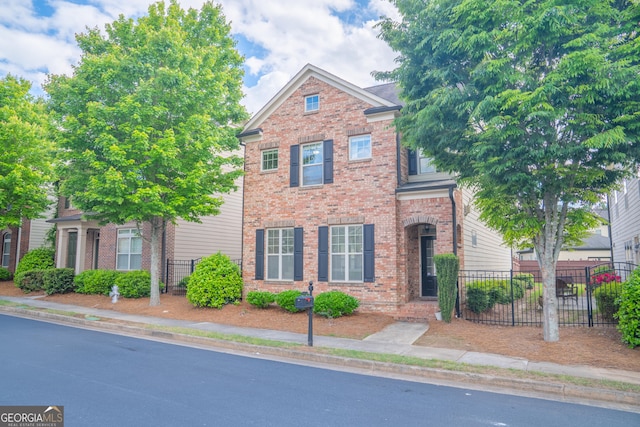 4448 Tacoma Trce, Suwanee, GA 30024 - traditional home featuring brick siding