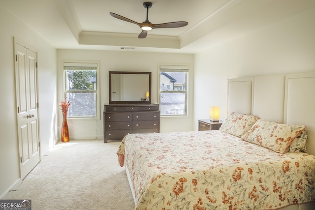 4448 Tacoma Trce, Suwanee, GA 30024 - bedroom featuring carpet floors, a tray ceiling, and ceiling fan