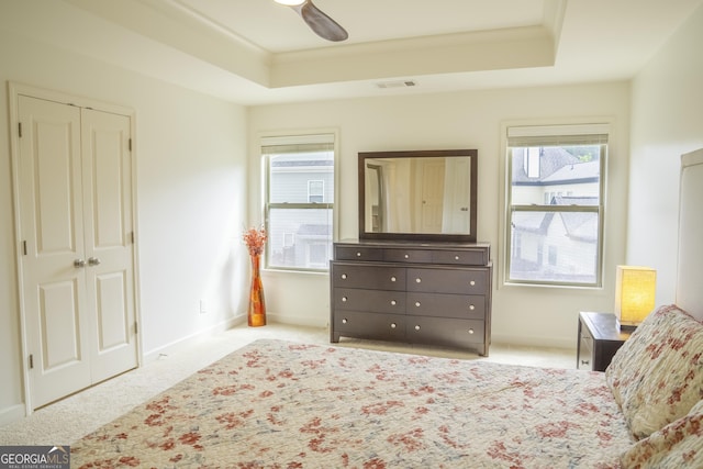 4448 Tacoma Trce, Suwanee, GA 30024 - carpeted bedroom with a tray ceiling, baseboards, and ceiling fan
