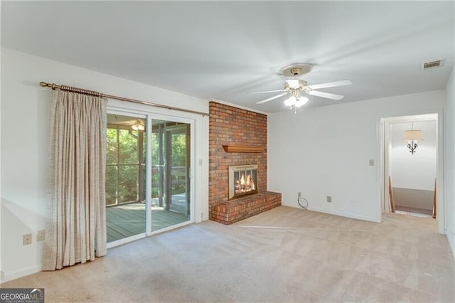 1471 Robinhood Trl, Gainesville, GA 30501 - unfurnished living room with ceiling fan, carpet, baseboards, and a fireplace