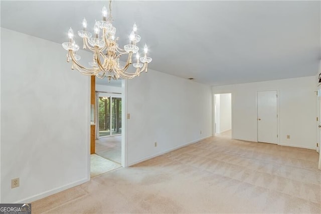 1471 Robinhood Trl, Gainesville, GA 30501 - unfurnished room with a chandelier, light carpet, and baseboards