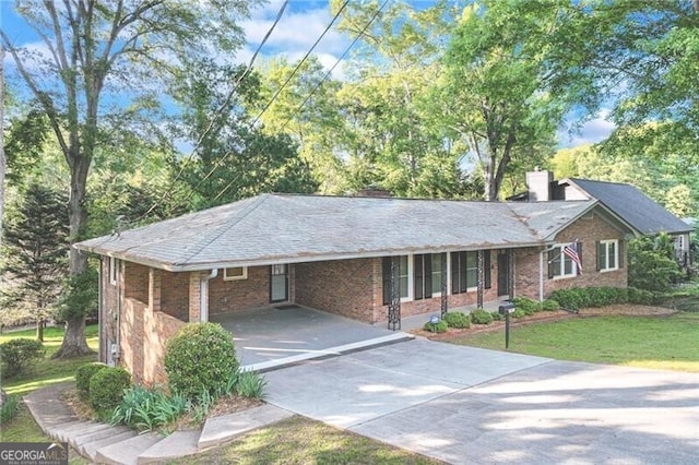 1471 Robinhood Trl, Gainesville, GA 30501 - ranch-style house with driveway, a chimney, brick siding, a front lawn, and an attached carport