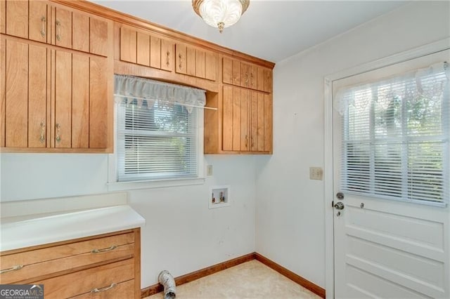 1471 Robinhood Trl, Gainesville, GA 30501 - laundry room with hookup for a washing machine, cabinet space, baseboards, and plenty of natural light