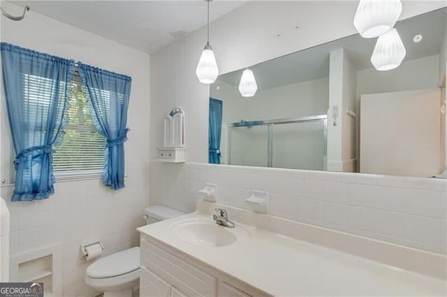 1471 Robinhood Trl, Gainesville, GA 30501 - bathroom featuring a shower stall, vanity, and tile walls