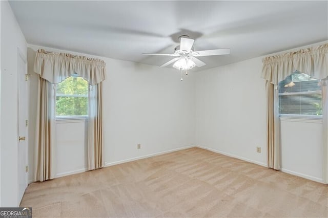 1471 Robinhood Trl, Gainesville, GA 30501 - spare room featuring ceiling fan, light carpet, and baseboards