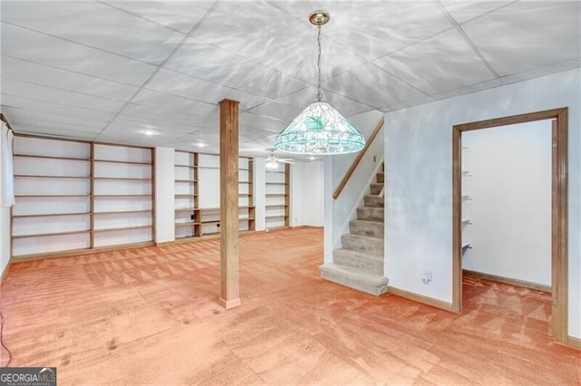 1471 Robinhood Trl, Gainesville, GA 30501 - finished basement with carpet flooring, stairway, and built in features