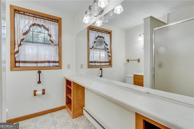 1471 Robinhood Trl, Gainesville, GA 30501 - bathroom featuring toilet, vanity, a shower stall, and baseboards