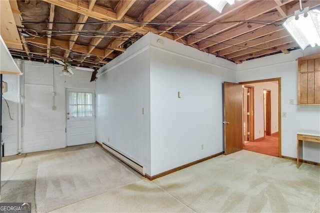 1471 Robinhood Trl, Gainesville, GA 30501 - basement with baseboard heating, light carpet, and baseboards