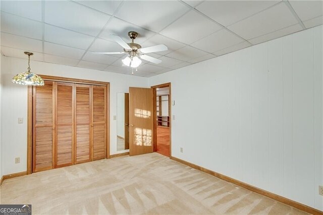 1471 Robinhood Trl, Gainesville, GA 30501 - unfurnished bedroom with a drop ceiling, a closet, carpet floors, and ceiling fan