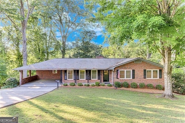 1471 Robinhood Trl, Gainesville, GA 30501 - single story home with brick siding, a front yard, driveway, and a chimney