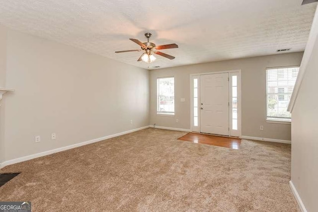 2838 Vining Ridge Ter Unit 0, Decatur, GA 30034 - carpeted entryway featuring a ceiling fan and baseboards