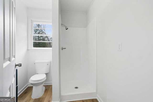 77 Frances St, Summerville, GA 30747 - full bathroom with a stall shower, crown molding, wood finished floors, toilet, and baseboards