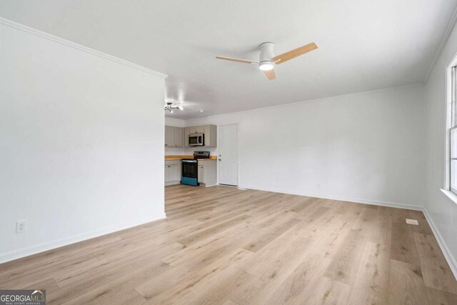 77 Frances St, Summerville, GA 30747 - unfurnished living room with light wood-type flooring, ornamental molding, ceiling fan, and baseboards