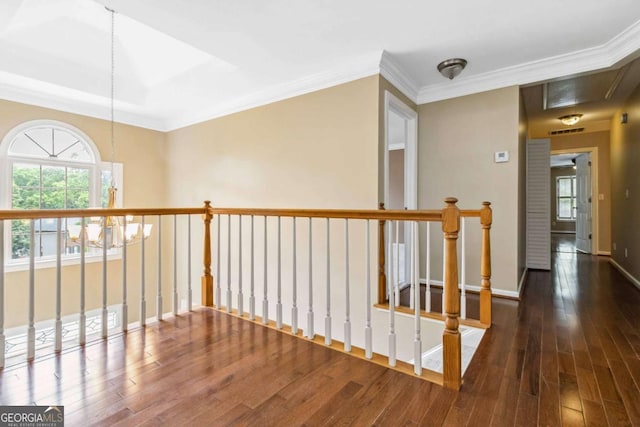 4002 Turnstone Dr NW, Kennesaw, GA 30152 - corridor with hardwood / wood-style floors, plenty of natural light, crown molding, an upstairs landing, and attic access