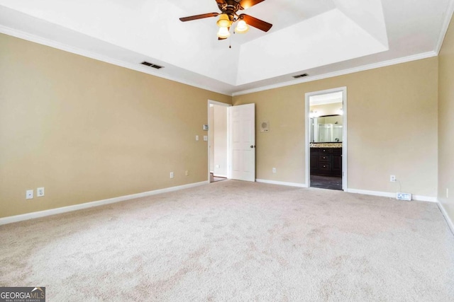 4002 Turnstone Dr NW, Kennesaw, GA 30152 - unfurnished bedroom with ornamental molding, carpet floors, baseboards, a raised ceiling, and connected bathroom