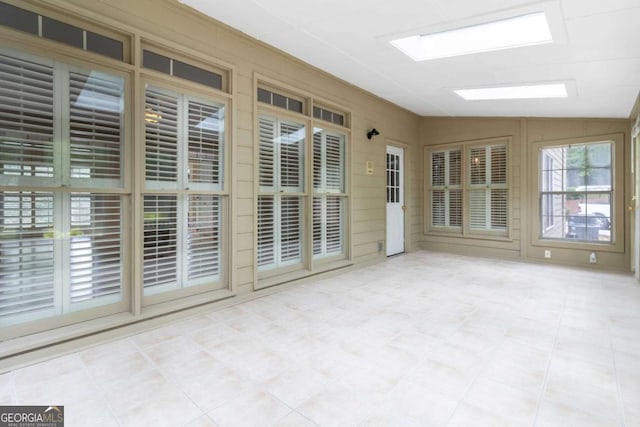 4002 Turnstone Dr NW, Kennesaw, GA 30152 - unfurnished sunroom featuring a skylight and vaulted ceiling