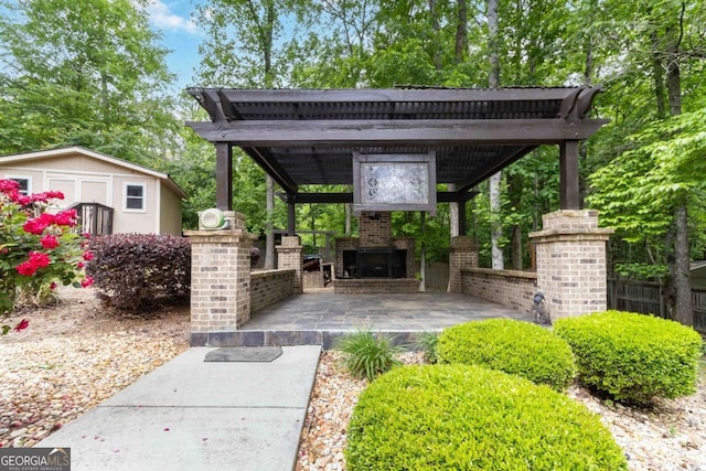 4002 Turnstone Dr NW, Kennesaw, GA 30152 - view of patio featuring an outdoor brick fireplace