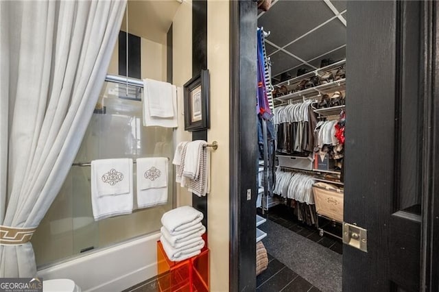 1421 Peachtree St NE Unit 203, Atlanta, GA 30309 - full bath featuring enclosed tub / shower combo and tile patterned flooring