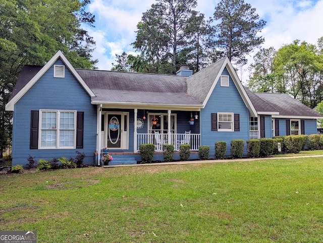 139 Heath Dr S, Macon, GA 31220 - view of front of house with a porch, a front lawn, and a shingled roof