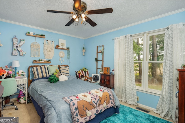 139 Heath Dr S, Macon, GA 31220 - bedroom featuring carpet floors, crown molding, a textured ceiling, and ceiling fan