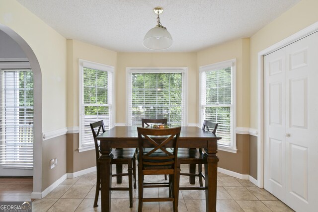 11 Vintage Ct SW, Cartersville, GA 30120 - dining area featuring healthy amount of natural light, light tile patterned floors, and a textured ceiling