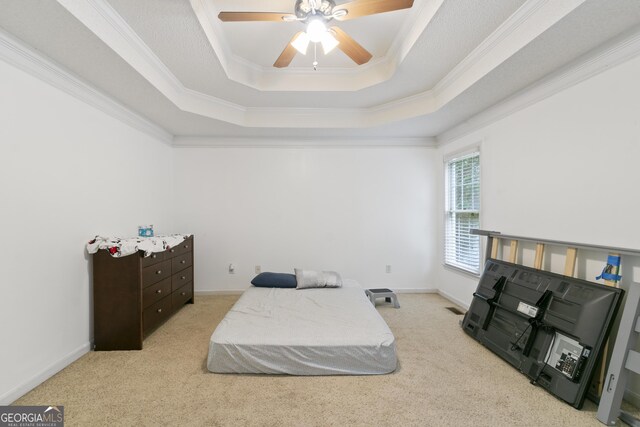 11 Vintage Ct SW, Cartersville, GA 30120 - carpeted bedroom with a tray ceiling, crown molding, and ceiling fan