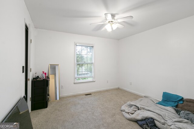 11 Vintage Ct SW, Cartersville, GA 30120 - unfurnished bedroom with light carpet, baseboards, and ceiling fan
