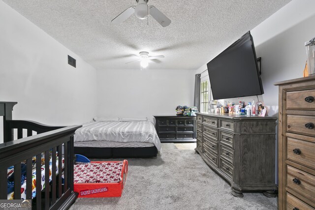 11 Vintage Ct SW, Cartersville, GA 30120 - carpeted bedroom featuring a textured ceiling and ceiling fan