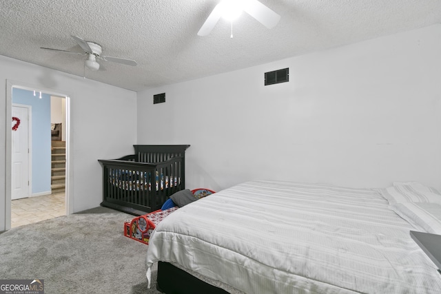 11 Vintage Ct SW, Cartersville, GA 30120 - bedroom featuring a textured ceiling, carpet floors, and ceiling fan