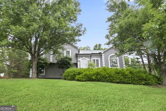 11 Vintage Ct SW, Cartersville, GA 30120 - split level home with stucco siding and a front yard