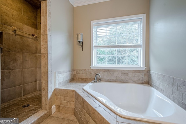 516 Main St, Hiram, GA 30141 - bathroom with a bath, ornamental molding, and tiled shower