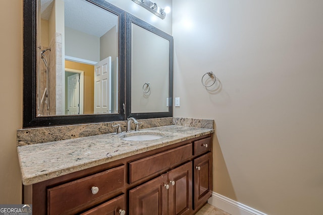 516 Main St, Hiram, GA 30141 - full bath with vanity, baseboards, and tile patterned flooring
