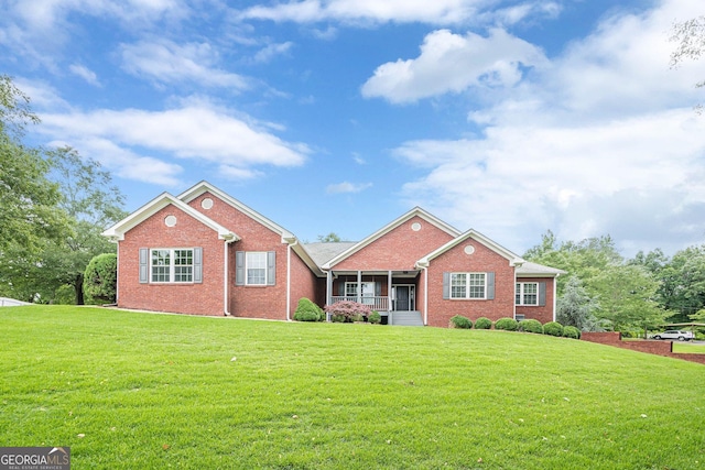 516 Main St, Hiram, GA 30141 - ranch-style house featuring brick siding and a front yard
