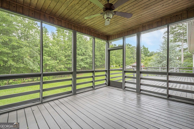 516 Main St, Hiram, GA 30141 - unfurnished sunroom with ceiling fan and view of scattered trees