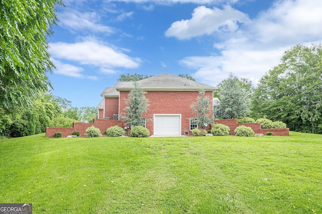 516 Main St, Hiram, GA 30141 - view of side of property featuring brick siding, a lawn, a garage, and roof with shingles