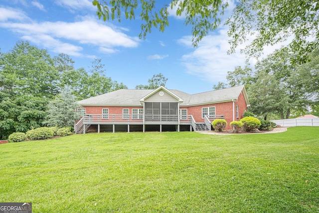 516 Main St, Hiram, GA 30141 - back of property with a sunroom, stairs, a wooden deck, and brick siding