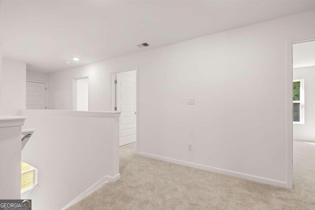1473 Autumn Wind Dr, Dacula, GA 30019 - empty room with light colored carpet, baseboards, and recessed lighting