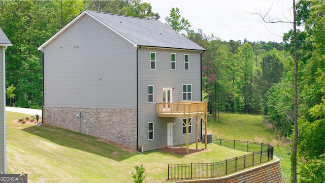 1473 Autumn Wind Dr, Dacula, GA 30019 - rear view of house featuring a deck, cooling unit, and brick siding