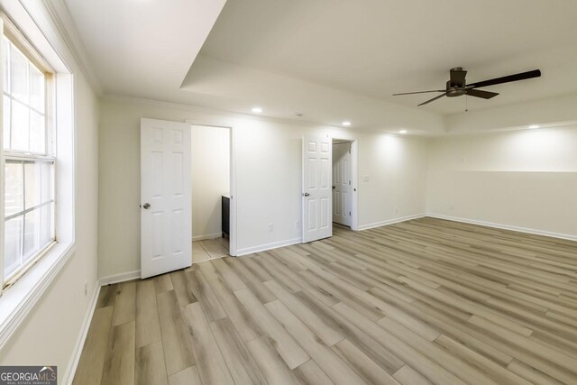 2192 Stenger Rd, Douglasville, GA 30135 - spare room featuring ceiling fan, recessed lighting, light wood-type flooring, baseboards, and plenty of natural light