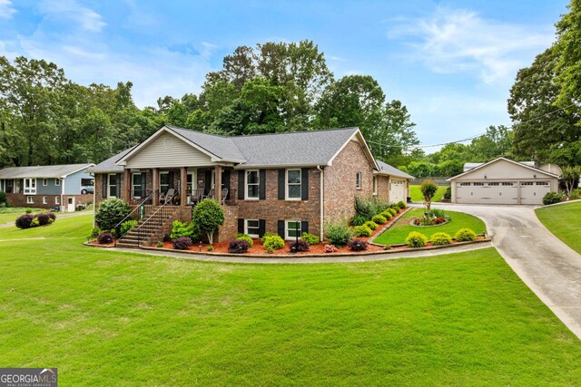 4010 Hamilton Mill Rd, Buford, GA 30519 - single story home featuring a garage, brick siding, a front yard, stairway, and an outdoor structure