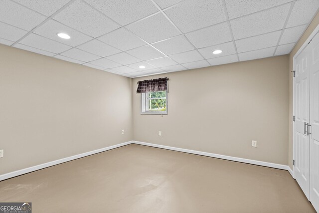 4010 Hamilton Mill Rd, Buford, GA 30519 - unfurnished bedroom featuring recessed lighting, baseboards, and a paneled ceiling