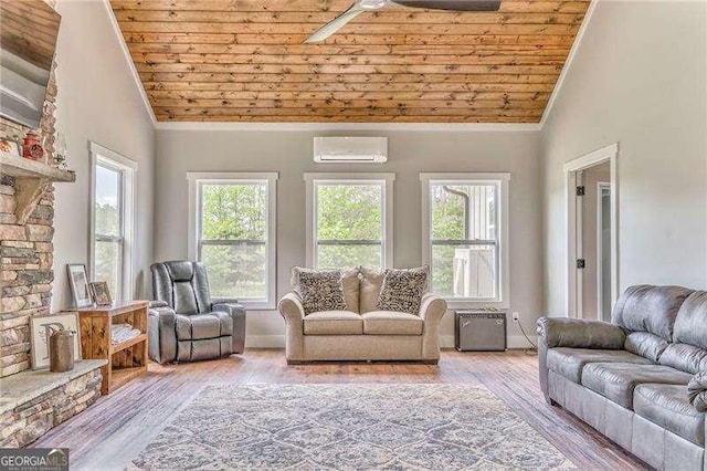 living room featuring wooden ceiling, crown molding, lofted ceiling, a wall unit AC, and wood finished floors
