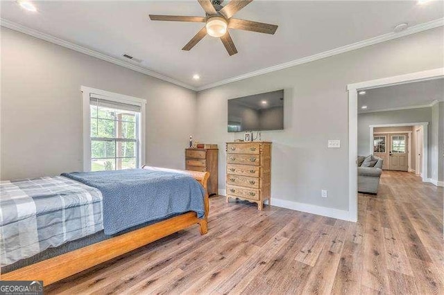 bedroom featuring wood finished floors, ornamental molding, baseboards, recessed lighting, and ceiling fan