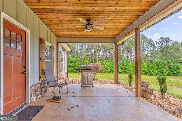 view of patio / terrace with ceiling fan and area for grilling